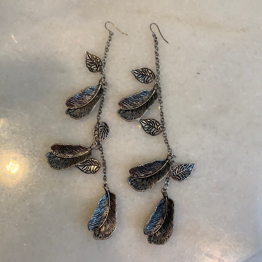 Beautiful very long silver feather earrings!